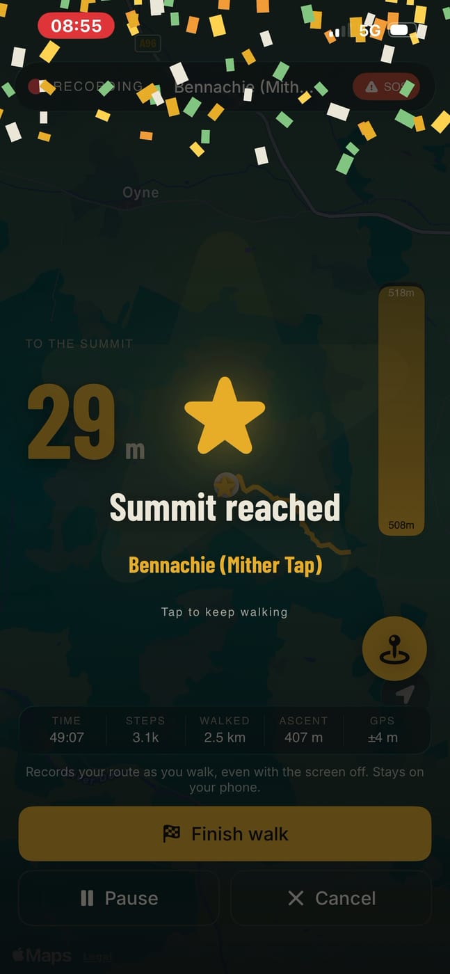 The app's summit reached screen for Bennachie (Mither Tap), confetti across the top