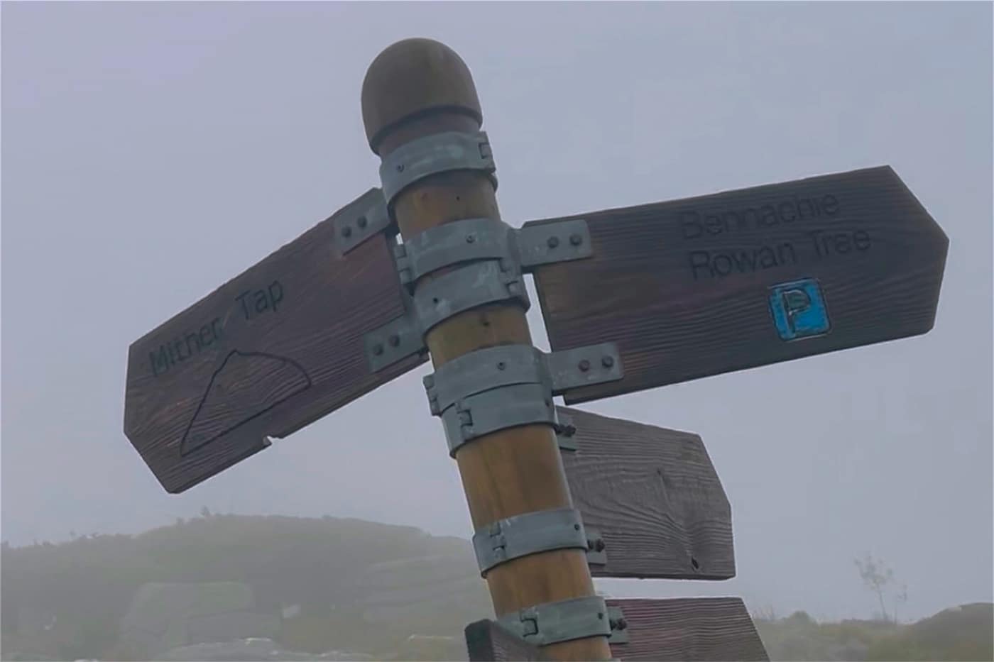 The fingerpost below the summit, Mither Tap one way and the Rowan Tree
car park the other, with nothing but grey
behind