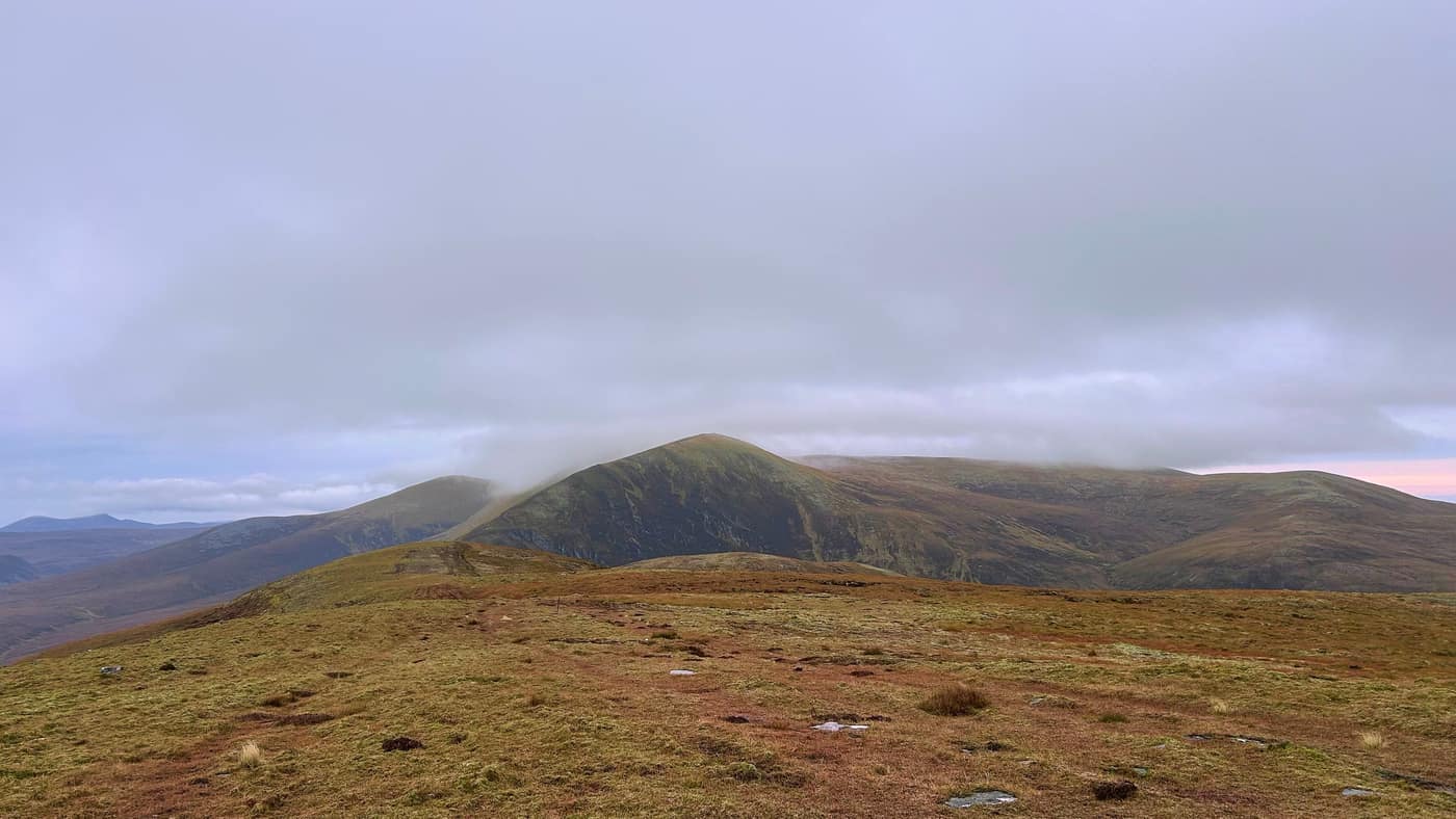 Ben Wyvis from the top of Little Wyvis, cloud sitting on its summit