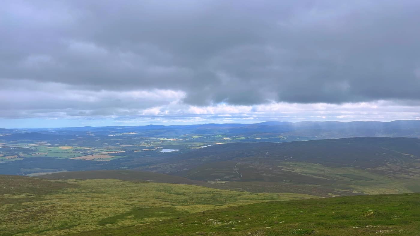 A shower of rain falling on the far hills