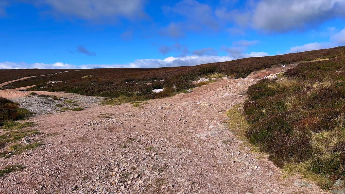 The crossroads on the moor — no sign, but the way on is obvious