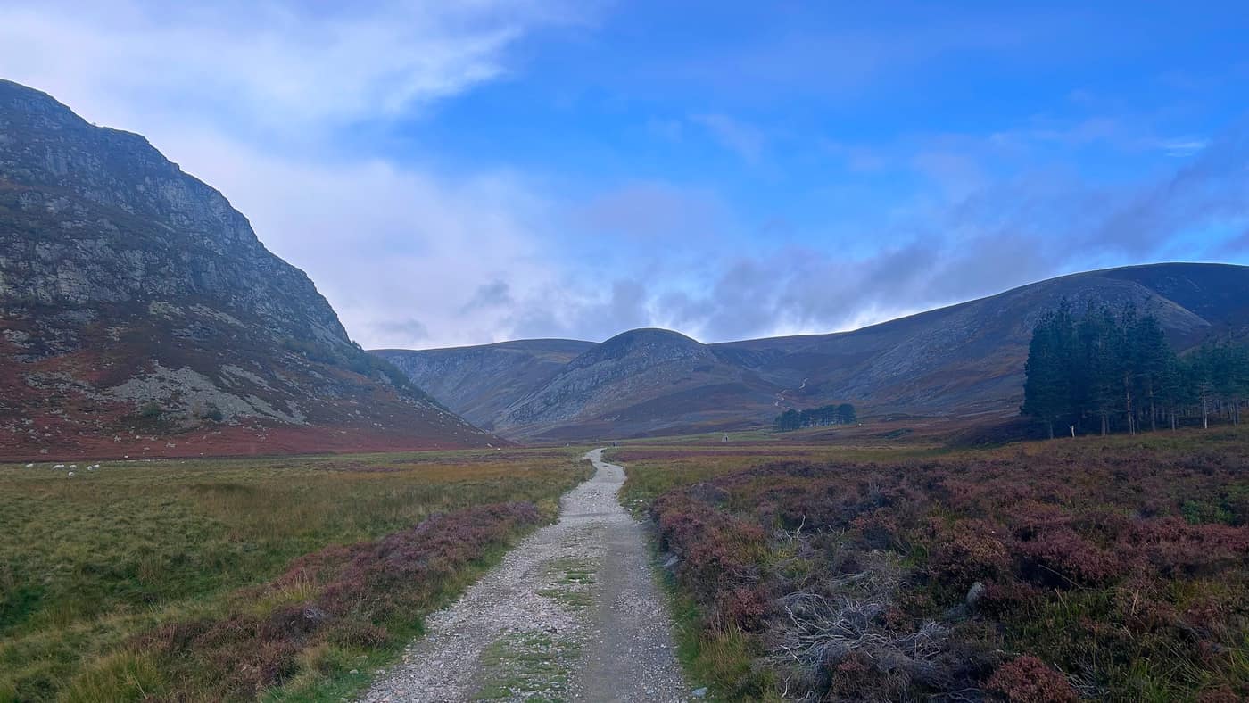 The track up the glen, the Queen's Well a dot in the distance below the hills