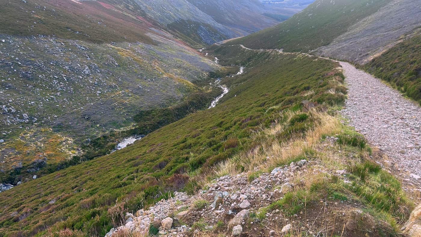 The path cut along the hillside above the burn, the glen far below