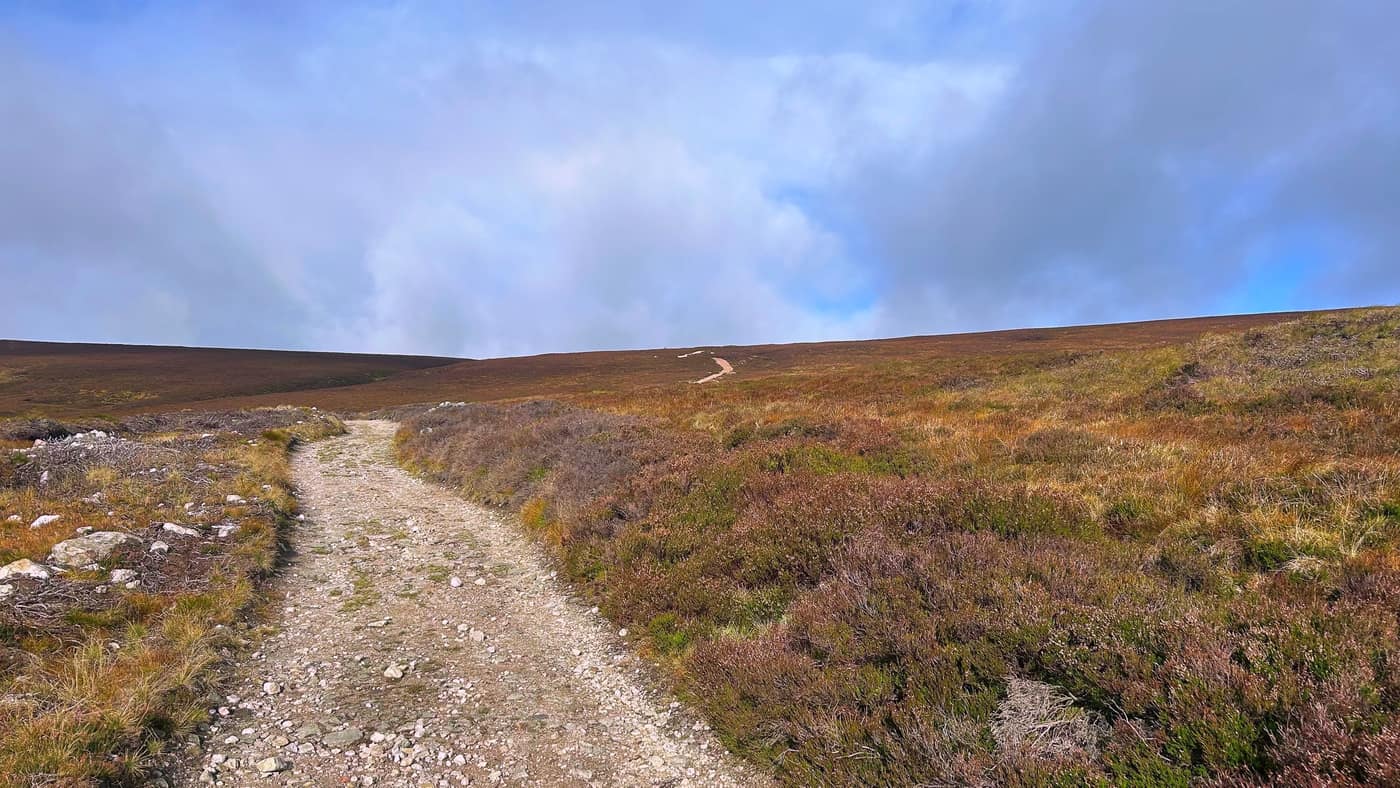 The track across the moor, the summit path visible in the distance