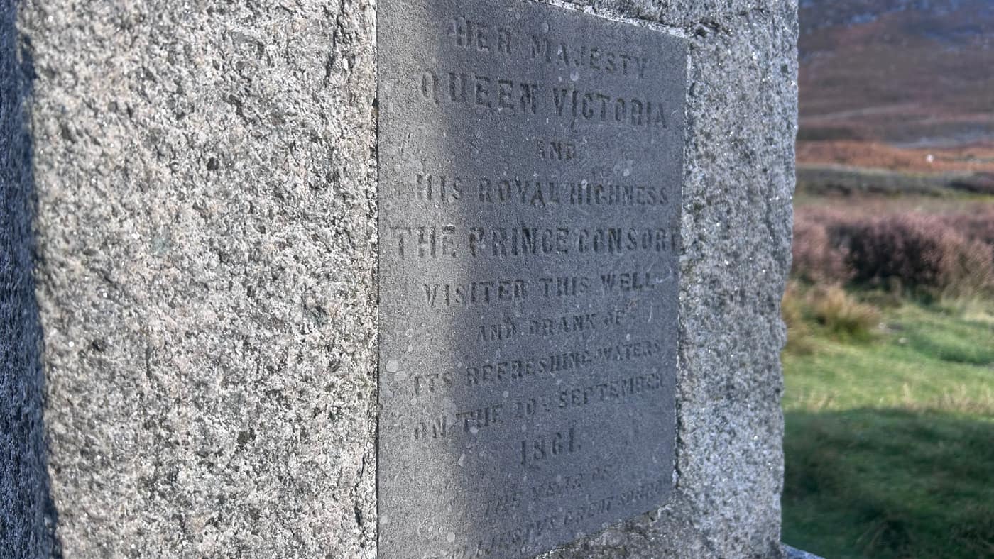 The plaque recording Queen Victoria and Prince Albert's visit to the well on 20 September 1861