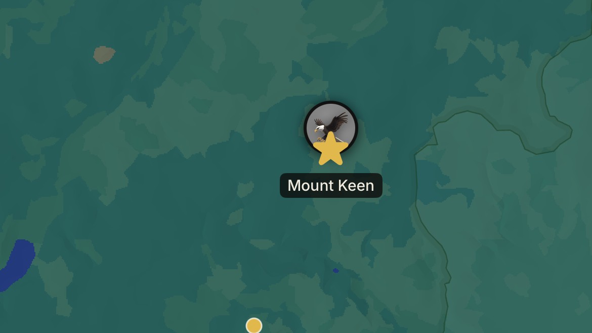 The app's map with the gold star on Mount Keen