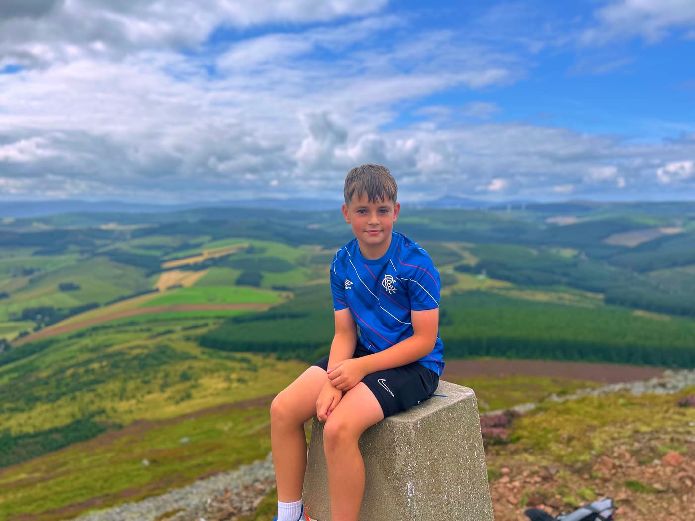 Another turn on the trig point at the summit