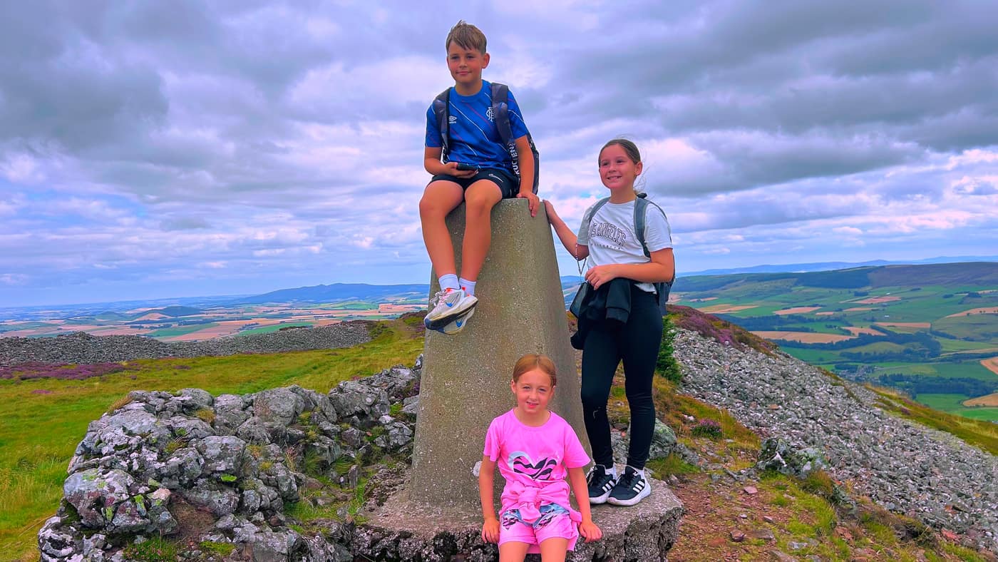 The three of them at the trig point on
top